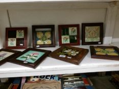 7 framed fireplace tiles including art nouveau and a Barboline majolica tile