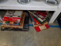 A quantity of vintage boxed games including Meccano