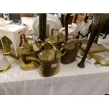 4 Victorian brass watering cans