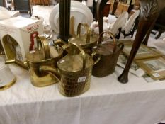 4 Victorian brass watering cans