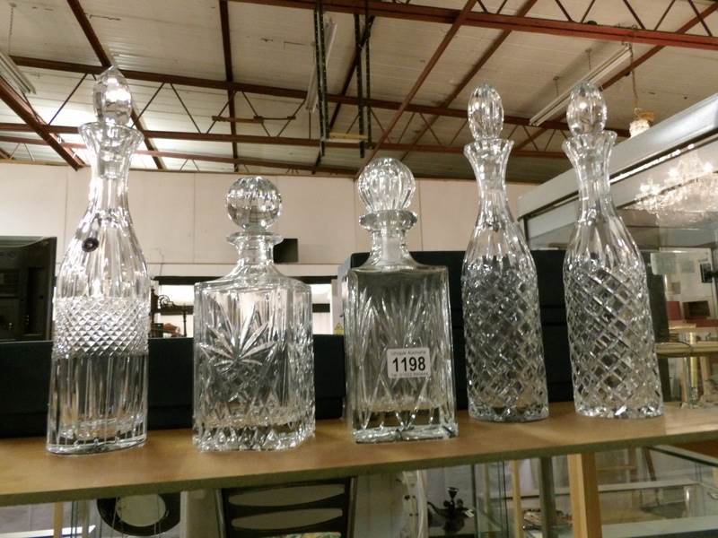 3 boxed Bohemian crystal decanters and 2 others