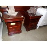 A pair of Stag mahogany bedside cabinets