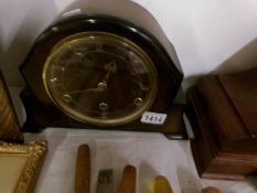 An art deco mantel clock with key