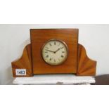 An art deco veneered mantel clock