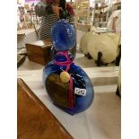 A large Byzance blue glass shop display scent bottle