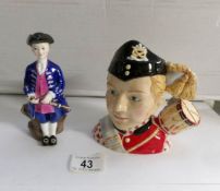 A Royal Doulton character jug 'Drummer Boy' and a Royal Doulton figurine 'Boy from Williamsburg'