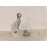 A Lladro figurine and  a Lladro ducks group
