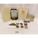 Three WW2 medals and ephemera relating to Private G e May, parachute regiment,