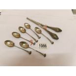 A set of 6 silver teaspoons, HM London 1894/5, and a set of silver handled glove stretchers,