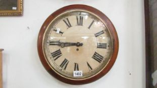 A circular wall clock (not working)