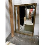 A gilt framed mirror