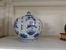 A blue and white ginger jar