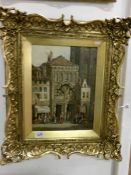 A framed oil on board 'Town Scene' bearing the signature H Schuler, 1899