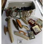 A box of costume jewellery including nail buffers