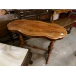 A figured mahogany occasional table