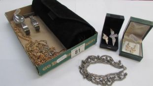 A quantity of yellow metal chains, a pair of earrings, an RAF sweetheart brooch,