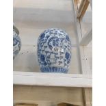 A blue and white ginger jar,