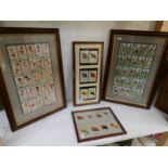 4 framed and glazed cigarette card displays including footballers and silks