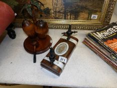 A rosewood and ebony flower press and a novelty palm tree smoker's stand