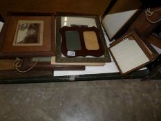 A quantity of pictures and picture frames