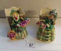 A pair of crinoline lady posy vases