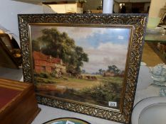 A gilt framed and glazed country scene