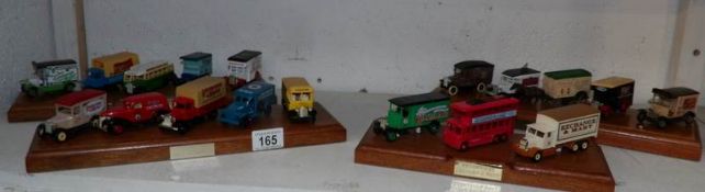 A collection of die cast commercial vehicles on bases marked Exchange and Mart