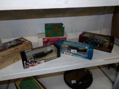 A mixed lot including boxed Ertl snap on trucks, Ertl Texaco fire chief tug boat,