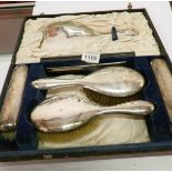 A cased silver 6 piece vanity set,