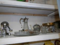 A mixed lot of glass and metal ware including claret jug