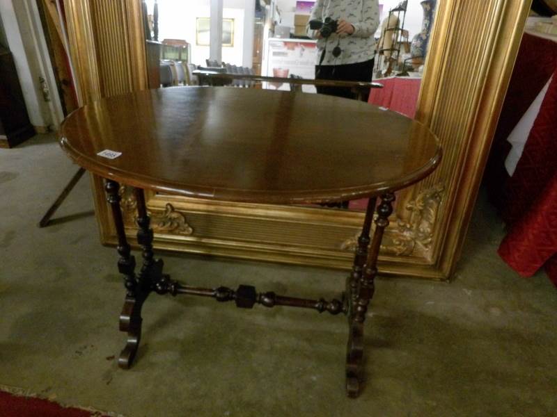 An oval occasional table