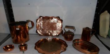 A mixed lot of old copper trays,