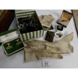 A mixed lot of jewellery including cuff links,
