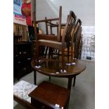 A Stag mahogany dining table and 4 chairs