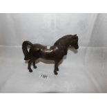 A heavy solid bronze horse