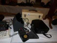 A quantity of photographic equipment including projector