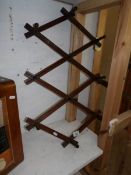 An expanding coat rack