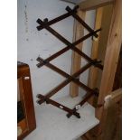 An expanding coat rack