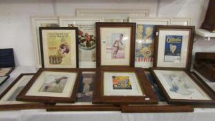 A quantity of framed advertisements including period and later