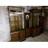 A pair of good quality Oriental lacquered display cabinets with bevelled glass