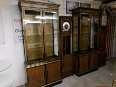 A pair of good quality Oriental lacquered display cabinets with bevelled glass