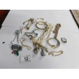 A mixed lot of jewellery and watches