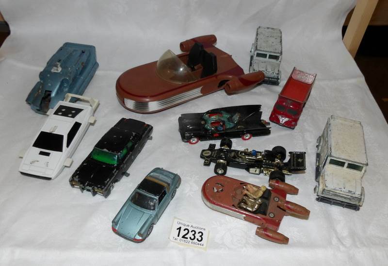 A box of Dinky and Corgi vehicles including Batmobile, James Bond,