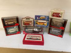 A collection of boxed coaches by Corgi, E.F.