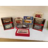 A collection of boxed coaches by Corgi, E.F.