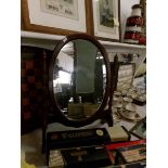 A dressing table mirror