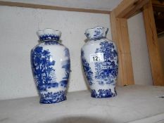 A pair of limited edition blue and white vase