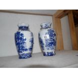 A pair of limited edition blue and white vase