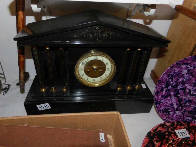 A black slate paladian style mantel clock converted to quartz movement