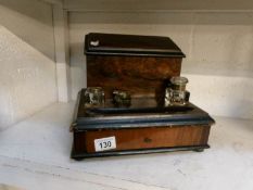 An Edwardian ink stand with stationary box and drawer,